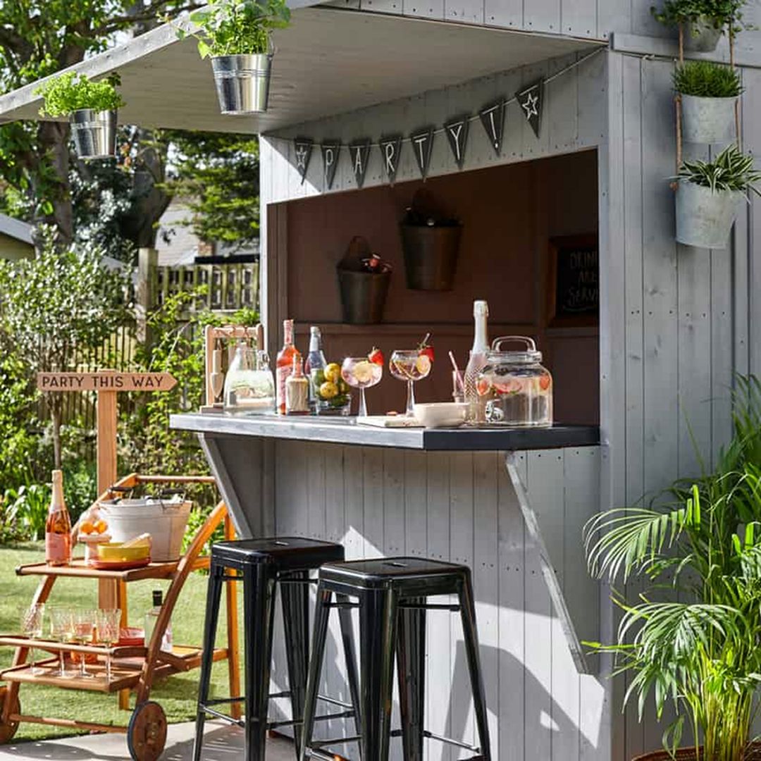 Garden bar shed with hanging herbs