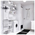 Elegant White Laundry Room Shelves via Blogspot