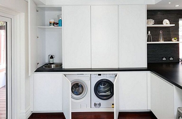 Ultra Modern Laundry Room with White Shelves via Smart Home Making3