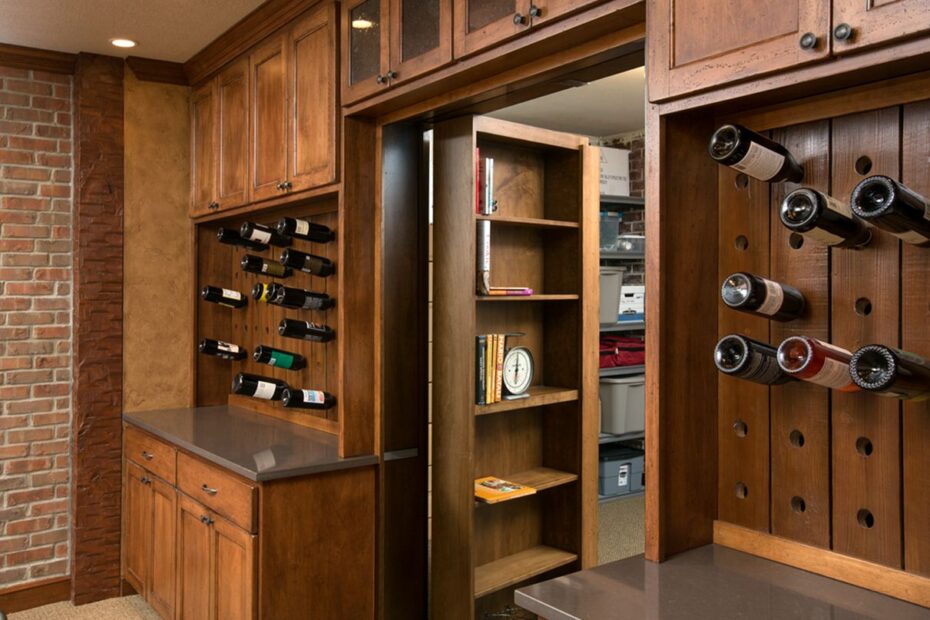 door hidden in the wine rack bookcase via Cleary Company