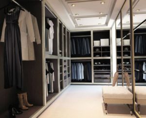 Walk In Wardrobe Closet Of Large With Clothing